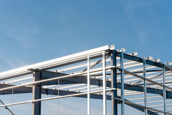 image of steel building structure in a blue sky